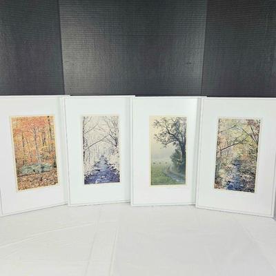Set of Four Framed and Matted Photographs Showing the Four Seasons - Signed by Colorado Photographer Gene Tylor.Â  Framed in White...