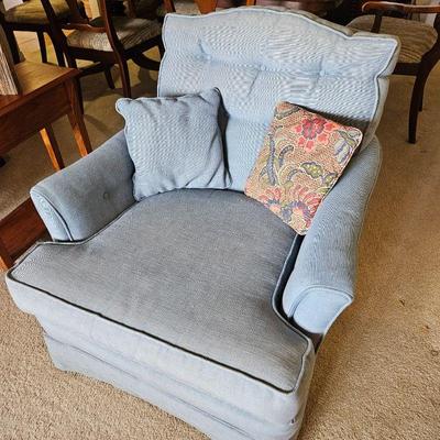 Cozy Light Blue Upholstered Armchair with Pillows