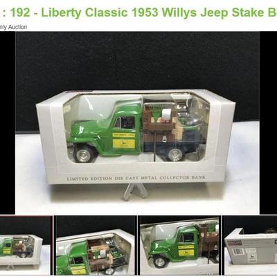 Lot # : 192 - Liberty Classic 1953 Willys Jeep Stake Bed
Stock #29020 John Deere and Die cast metal bank replica of 1953 Willys Jeep...