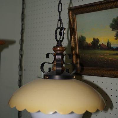 70's hanging yellow tin shade light. Good condition- there are two of these lamps 