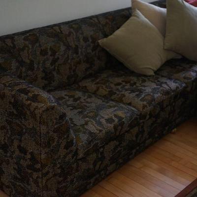 This is a sofa sectional of a smaller size. L shaped if you want with a matching ottoman. 