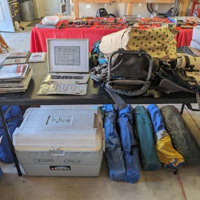 camp chairs, cooler, backpacks, Delorean memorabilia