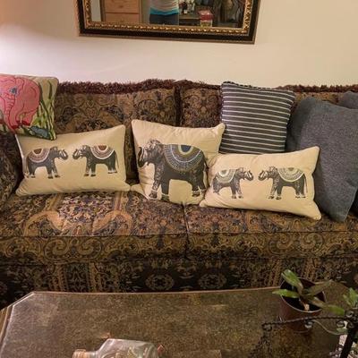 Sofa with elephant accent pillows 