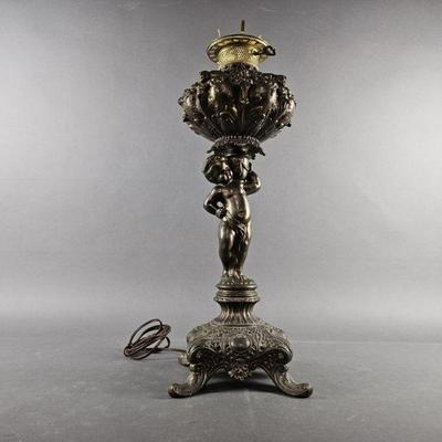 Lot 320 | Antique Cherub Table Lamp