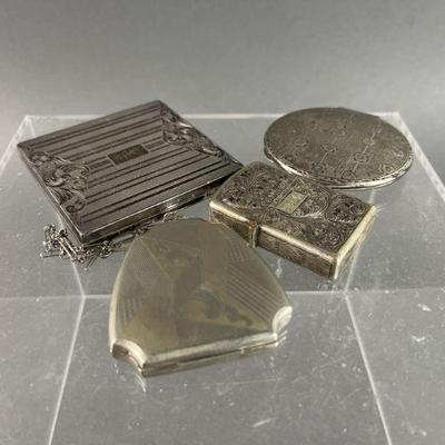 Lot 128 | Antique Compacts, Lighter, & Cases