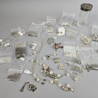 Lot 187 | Sterling Silver Charms, Clasps, and More