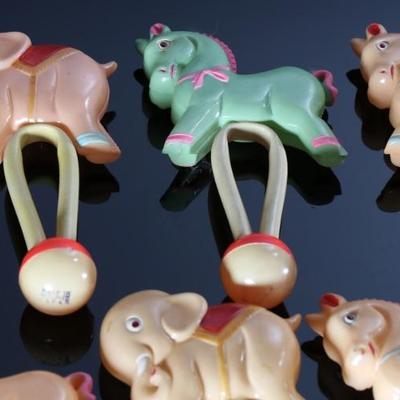 Lot of 9 Vintage Celluloid Occupied Japan Horse/Elephant Toys Baby Rattles	7x4x1in	196231
Lot of 9 Vintage Celluloid Occupied Japan...