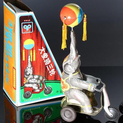 Lot of 3 Vintage Blic Wind-Up Tin Litho Elephant on Bike Toys in Box	6 x 14 x 10 in	198028
