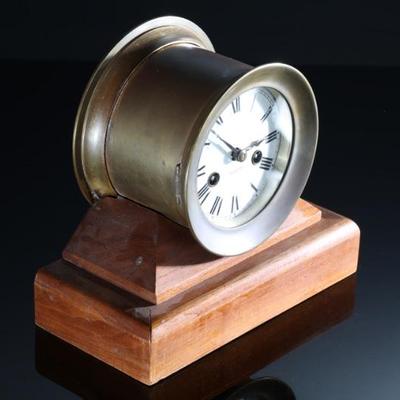 Antique Waterbury Brass Ship Clock on Base Nautical Marine	Clock Bezel: 5.5in<BR>Total: 7.75x9x4.5in	199016
