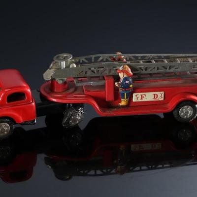 1950s Vintage Japan Tin Friction Aerial Ladder Fire Engine Truck	3x2x11in	196154
