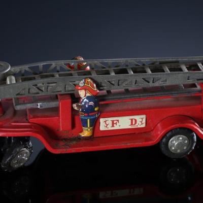 1950s Vintage Japan Tin Friction Aerial Ladder Fire Engine Truck	3x2x11in	196154
