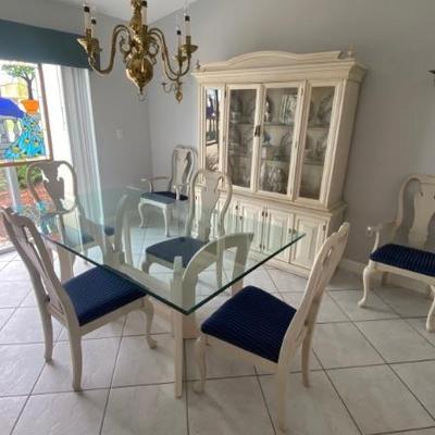 White wash wood and glass dining room table  and white chairs 72" x 41" White Hutch 74 1/2" x 63" x 17"
