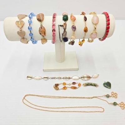 #220 • Bracelets, Necklace & Pendants
