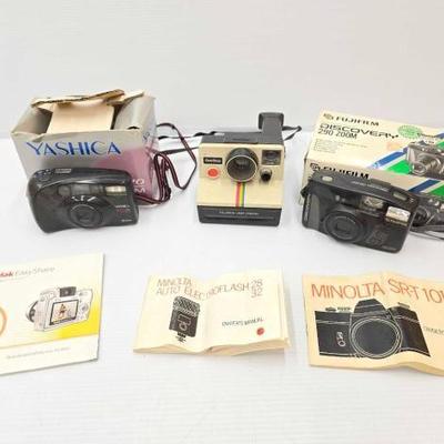 #240 â€¢ (3) Vintage Cameras & Owner Manuals
