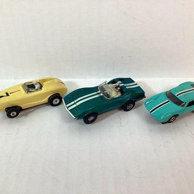 BIHY701 Vintage Aurora TJET & TYCO Slot Cars	Three vintage Aurora TJET and TYCO slot cars. Includes an Aurora GT in turquoise with a...