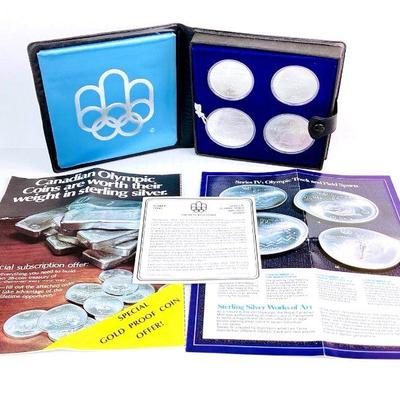 SHBR910 1976 Montreal Olympic Silver Coin Set	Series IV Olympic Track & Field silver proof unc 4 coin set, 92.5% pure silver.

