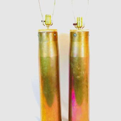 MACH951 Trench Art Table Lamp Pair	Two vintage table lamps handcrafted crafted from 105 MM ammo. Â Both lamps work, shades not included.
