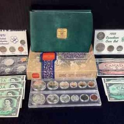 SHBR708 Canadian Minted Money	A collection of various Royal Canadian bills and coinage. Includes a Royal Canadian 2002 minted Golden...