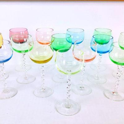 MACH964 Hand Blown Twisted Stem Goblets	14 glasses, 1 green glass shows very visible uranium in glass, other colors show light glow rings...