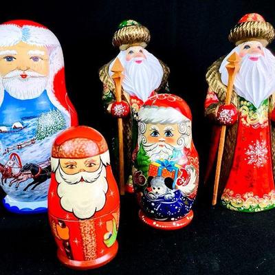 SHBR904 Russian Christmas Matryoshka Dolls & More	2 hand carved wooden Santa's, made in Russia. 4 Russian nesting dolls.
