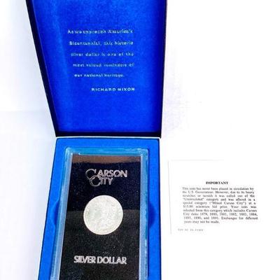 SHBR911 Carson City 1880 Silver Dollar	Historic silver dollar culled out of circulation in plastic case and original black box with...