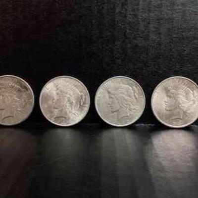 SHBR706 1920s Liberty Silver Dollars	A collection of 4 Liberty Silver Dollars, minted in the 1920s. Mint years include 3 coins that were...