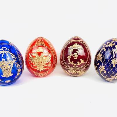 SBHR908 St Petersburg Russian Faberge Crystal Eggs	4 crystal glass eggs in cobalt, blue, red, & burgundy with gold gilt decoration. Â...