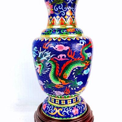 SHBR902 Vintage Cloisonne Vase	12 inch tall vase in vibrant colors with dragon design and wooden 2.25 inch tall base/stand.
