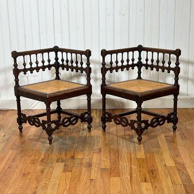 (2PC) ORNATE CORNER CHAIRS | Chairs have carved bulbous spindle backs, ornate stretcher with caned seats.