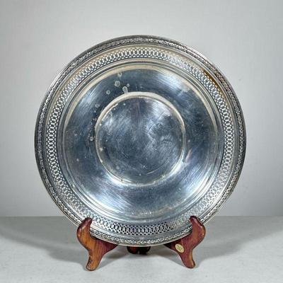 STERLING SILVER PLATE | Sterling silver plate with a reticulated rim; 6.40 ozt