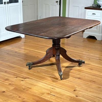 ANTIQUE ENGLISH TILT TOP BREAKFAST TABLE | Rams Head  mounted casters, carved quadruped base, turned support Tilt top has been made to...