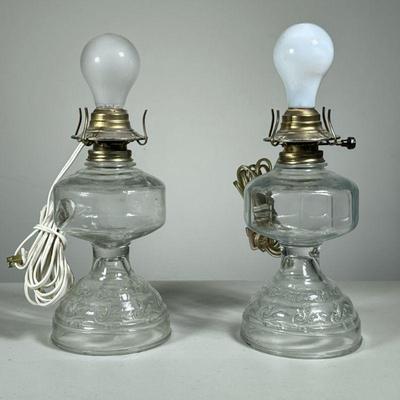 (2PC) PAIR OF GLASS OIL LAMPS | Pair of electrified glass oil lamps.