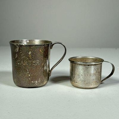 (2PC) STERLING BABY CUPS | Including a Tiffany â€œCarterâ€ cup and a smaller â€œColinâ€ cup; together 4.95 ozt