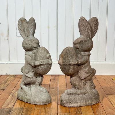 PAIR CAST CEMENT EASTER BUNNIES | Holding eggs