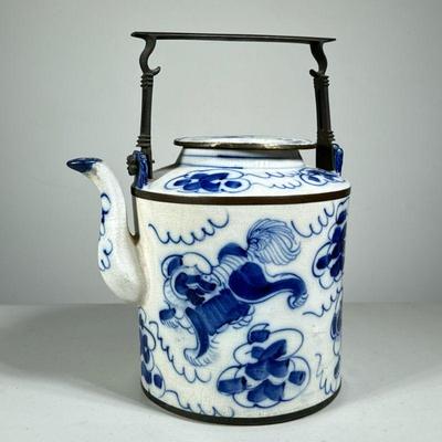 CHINESE PORCELAIN TEAPOT | Large blue and white teapot decorated with tigers,  metal handle