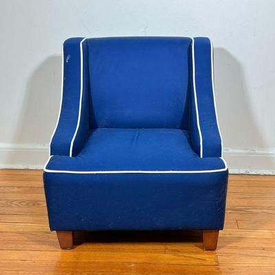 CHILDâ€™S ARMCHAIR | Navy blue with white border upholstered childâ€™s armchair over wooden legs