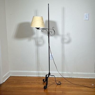 WROUGHT IRON FLOOR LAMP | Adjustable wrought iron floor lamp with tripod base and a pierced paper lamp shade