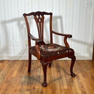 CHIPPENDALE STYLE ARMCHAIR | With ball & claw feet and needlepoint seat.