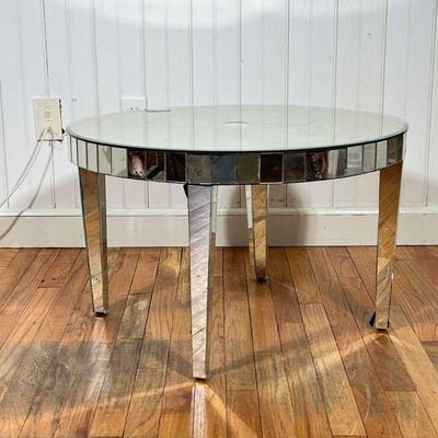 MIRRORED COFFEE TABLE | Round coffee table with mirrored top over paneled mirror sides & legs
