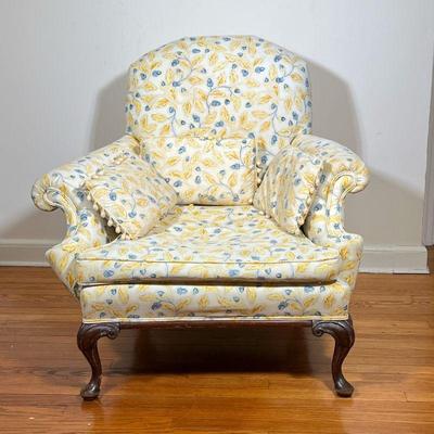 QUEEN ANNE STYLE ARMCHAIR | Having cabriole legs with scroll carvings