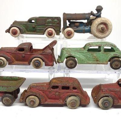 7 Early Arcade Cast Iron Toy Trucks & Cars