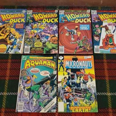 (6) Vintage Comic Books
Four Howard the Dunk, AuquaMan, and Micronauts. 35 cent and 30 cent comics. DC and Marvel Mix.