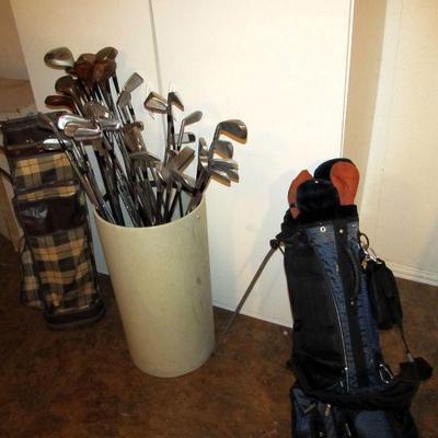 Vintage and newer golf clubs