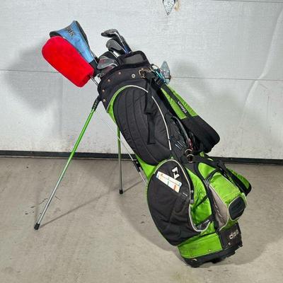 OGIO GOLF BAG & CLUBS | Includes: green OGIO golf bag, Lynx Tigress 14 degree driver, Ping Eye 2 driver, Callaway X9W 23 degree driver,...