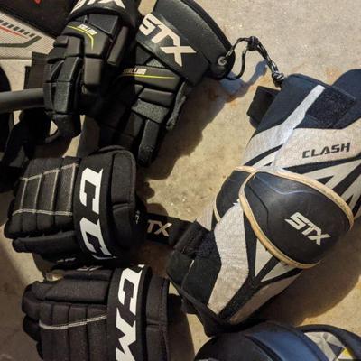 Lacrosse gloves and pads
