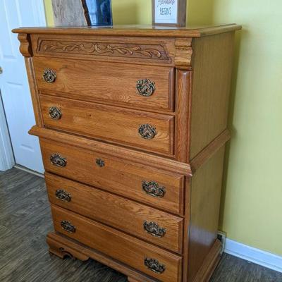 One of 2 matching tall dressers 