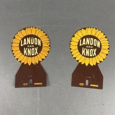 Lot 17 | 2 Vintage Landon and Knox License Plate Toppers