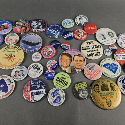 Lot 21 | 40 Vintage & Contemporary Pinback Buttons. Some names include Carter, Bush, Dole, Kemp, Dukakis, Kerry, Clinton, Gore, Obama &...