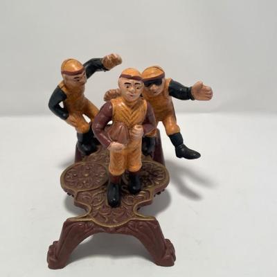 Cast iron rugby football players bank -$15