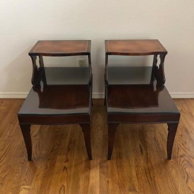 Vintage leather top step end tables in excellent condition. 